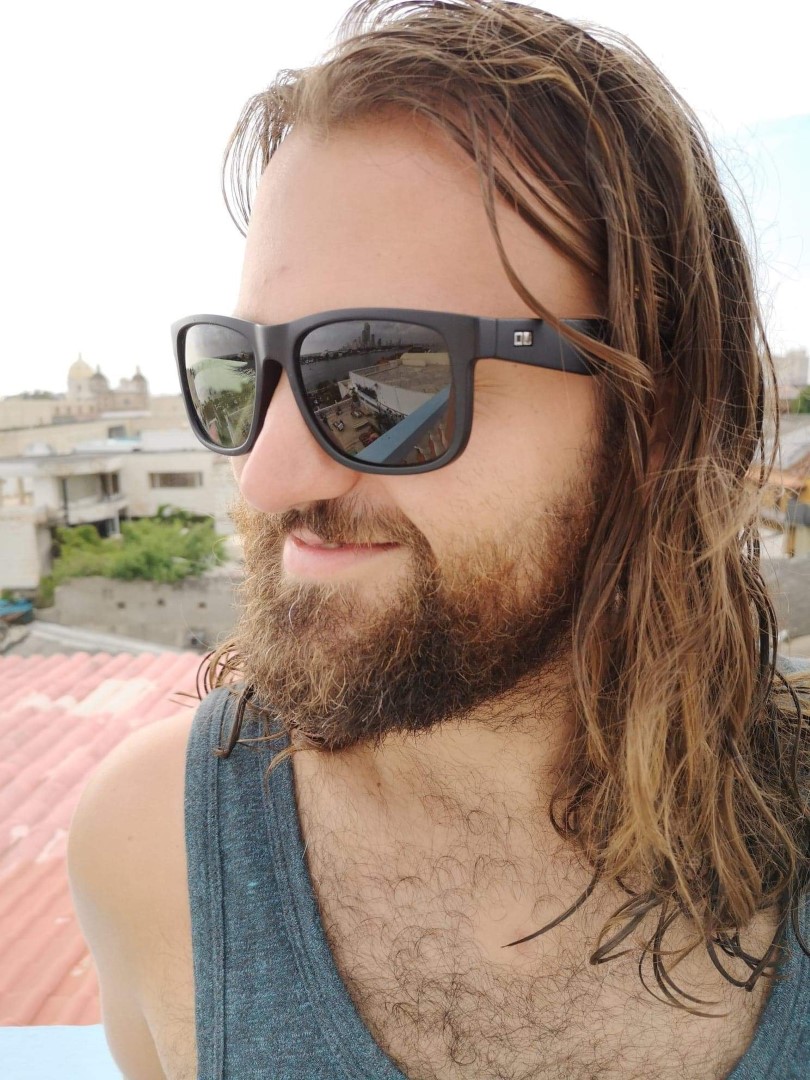 Hairy guy with sunglasses